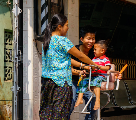 Mandalay, Myanmar - Feb 21, 2016. Local people on street near market in Mandalay, Myanmar.のeditorial素材