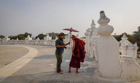 Bagan, Myanmar - Feb 21, 2016. People walking at ancient Buddhist temple in Bagan, Myanmar.のeditorial素材