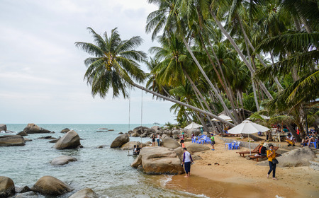 Kien Giang, Vietnam - Apr 6, 2018. Tourists enjoying on beach of Nam Du Island at sunny day in Kien Giang, Vietnam.のeditorial素材