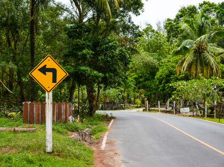 Rural road at summer day on Phuket Island, Thailand.の写真素材