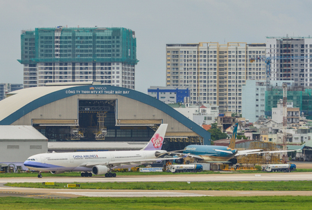 Saigon, Vietnam - Jun 3, 2018. Passenger airplanes docking at Tan Son Nhat Airport (SGN) in Saigon (Ho Chi Minh City), Vietnam.のeditorial素材