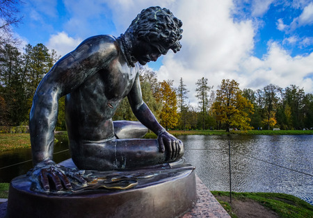 Saint Petersburg, Russia - Oct 7, 2016. Ancient sculptures at the garden of the Catherine Palace in sunny day.のeditorial素材