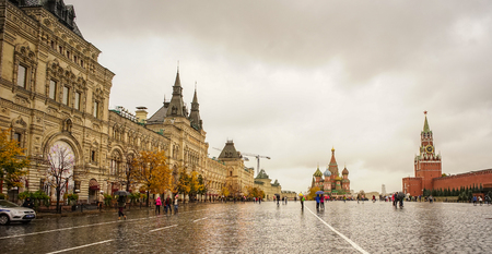 Moscow, Russia - Oct 4, 2016. People walking on Red Square in rainy day. The square is the most recognizable symbol of Russia in the world.のeditorial素材