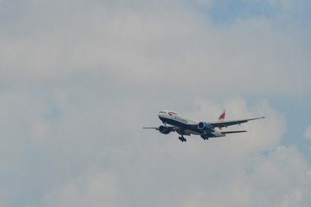 Bangkok, Thailand - Apr 21, 2018. A Boeing 777-200ER airplane of British Airways landing at Bangkok Suvarnabhumi Airport (BKK).のeditorial素材