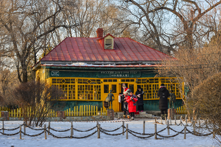 Harbin, China - Feb 22, 2018. A wooden house at village in Harbin, China. Harbin is largest city in the northeastern region of China.のeditorial素材