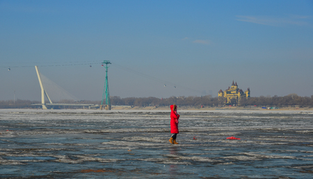 Harbin, China - Feb 22, 2018. People walking on Songhua ice river in Harbin, China. Harbin is largest city in the northeastern region of China.のeditorial素材