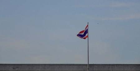 National flag of Thailand on a building in Bangkok, Thailand.