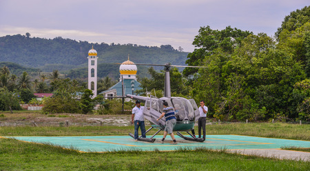 Langkawi, Malaysia - Apr 30, 2018. A helicopter ready to take-off from airfield in Langkawi, Malaysia.のeditorial素材