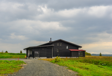 A wooden house at countryside in Hokkaido, Japan.の写真素材