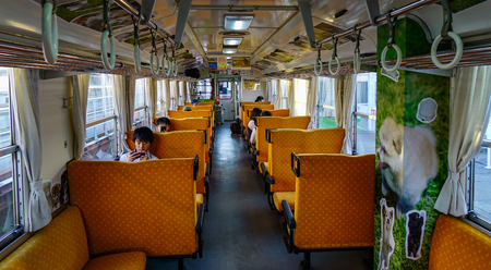 Akita, Japan - Sep 26, 2017. Passengers on the train in Akita, Japan. Railways are the most important means of passenger transportation in Japan.のeditorial素材