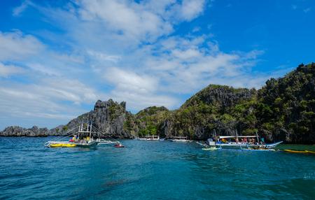 Palawan, Philippines - Apr 5, 2017. Tourist boats on lagoon in Palawan, Philippines. Palawan is the island of idyllic tropical beauty.のeditorial素材
