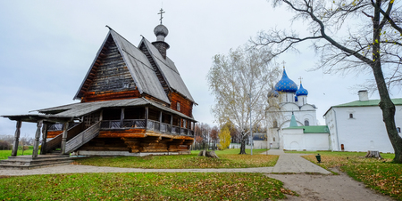 An ancient wooden architecture with garden in Suzdal, Russia.の写真素材