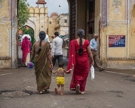 Jaipur, India - Nov 1, 2015. Indian women walking on street in Jaipur, India. Jaipur is the capital and the largest city of the Indian state of Rajasthan in Western India.のeditorial素材