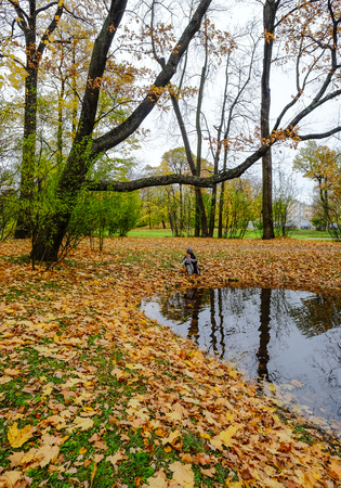 Saint Petersburg, Russia - Oct 11, 2016. People enjoying at autumn park in Saint Petersburg, Russia.のeditorial素材