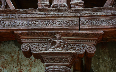 Ancient wooden carving on the entrance to Alchi monastery in Ladakh, India.