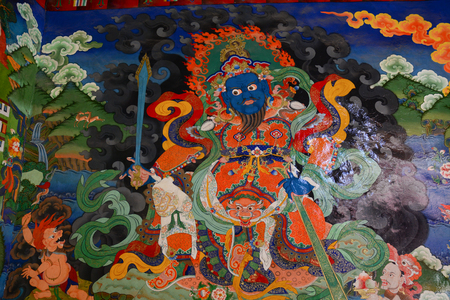 Leh, India - Jul 15, 2015. God painting on wall of ancient Tibetan monastery in Leh, India.のeditorial素材