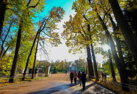 St. Petersburg, Russia - Oct 9, 2016. People walking at the Lower Garden of Peterhof. Peter the Great first mentions the Peterhof site in his journal in 1705.のeditorial素材