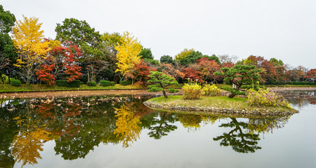 Lake scenery with autumn trees in Kyoto, Japan.のeditorial素材