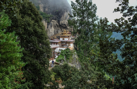 View of Taktsang Palphug Monastery (Tiger Nest) on misty mountain in Paro, Bhutan.のeditorial素材