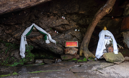 Paro, Bhutan - Sep 3, 2015. Holy water in the cave near Taktshang Goemba (or Tiger Nest) Monastery in Paro, Bhutan.のeditorial素材