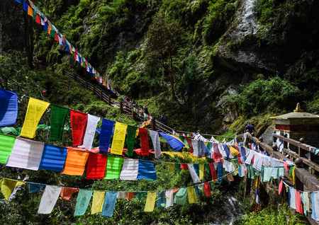 Paro, Bhutan - Sep 3, 2015. Tibetan Buddhist prayer flags hanging on mountain in Paro, Bhutan.のeditorial素材