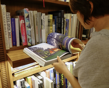 Seoul, South Korea - Sep 21, 2016. A young woman reading book at the bookstore in Seoul, South Korea. Seoul is the largest city in South Korea.のeditorial素材