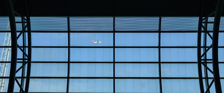 Jeju, South Korea - Sep 21, 2016. Airplane taking off, view from Boarding Gate of Jeju International Airport (CJU).のeditorial素材