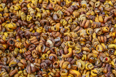 Dried traditional herbal for sale at street market in Sichuan, China.の写真素材
