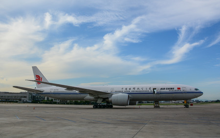 Beijing, China - Aug 14, 2016. A Boeing 777-300ER airplane of Air China docking at Beijing Capital International Airport (PEK).のeditorial素材