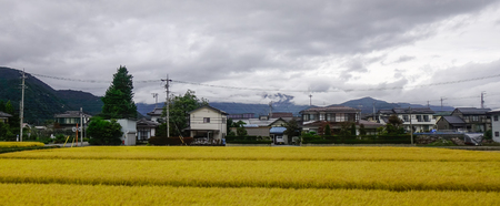 Mountain township at misty day in Nagano, Japan.の写真素材
