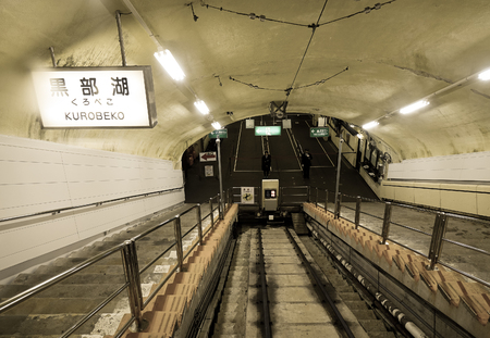 Toyama, Japan - Oct 4, 2017. Underground rail track with tunnel at Tateyama Kurobe Alpine Route in Toyama, Japan.のeditorial素材