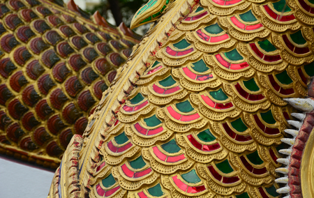 Details of dragon statue at ancient temple in Chiang Mai, Thailand.のeditorial素材