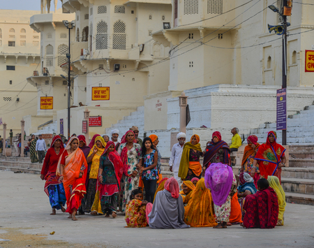 Pushkar, India - Nov 5, 2017. Indian women at holy site in Pushkar, India. Pushkar is a pilgrimage site for Hindus and Sikhs, located in State of Rajasthan.のeditorial素材
