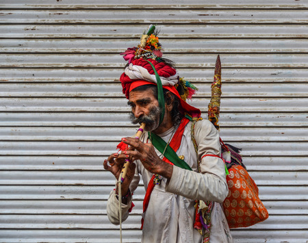 Pushkar, India - Nov 5, 2017. Musician playing traditional Rajasthani music on the street in Pushkar, India.のeditorial素材