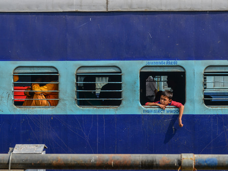 Varanasi, India - Nov 5, 2017. A local train stopping at railway station in Varanasi, India. Varanasi is the holiest of the seven sacred cities in Buddhism and Hinduism.のeditorial素材