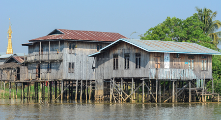 Inle, Myanmar - Feb 15, 2016. Wooden floating houses on Inle Lake, Myanmar. Inle Lake is a freshwater lake located in the Taunggyi District of Shan State.のeditorial素材
