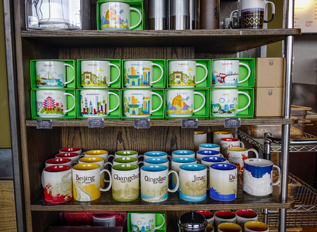 Beijing, China - Feb 28, 2018. Goods on display at Starbucks coffee shop in Beijing Capital International Airport (PEK).のeditorial素材