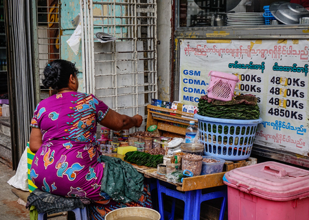 Yangon, Myanmar - Feb 26, 2016. Selling street food in Yangon, Myanmar. Yangon is Myanmar largest city and its most important commercial centre.のeditorial素材
