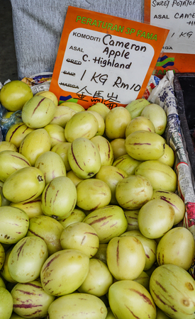 Pahang, Malaysia - Jun 22, 2014. Cameron apples for sale in the rural market.のeditorial素材