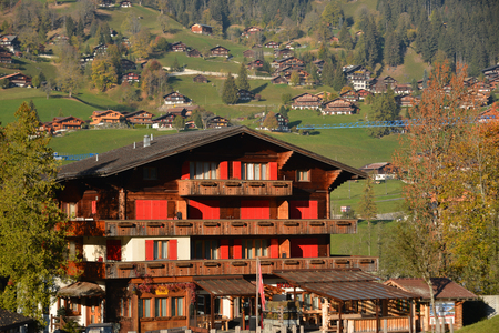 A wooden house in Grindelwald, Switzerland. Grindelwald was one of the first tourist resorts in Europe.のeditorial素材