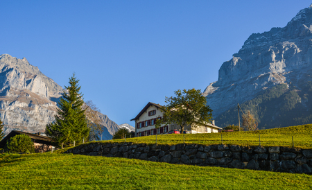 Mountain village in Grindelwald, Switzerland. Grindelwald was one of the first tourist resorts in Europe.のeditorial素材