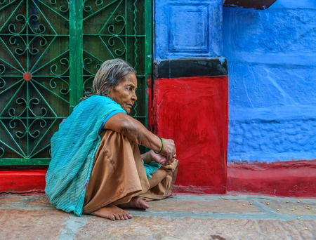 Jodhpur, India - Nov 6, 2017. An old woman in traditonal dress (sari) on street in Jodhpur, India. Jodhpur is the second largest city in state of Rajasthan.のeditorial素材