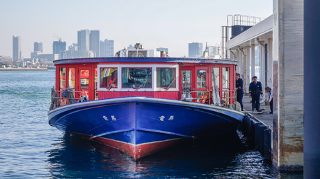 Tokyo, Japan - Jan 4, 2016. Wooden ferry at the jetty on Tokyo Bay, Japan. The ferry connecting major tourist spots along Sumida River such as Asakusa, and Odaiba.のeditorial素材