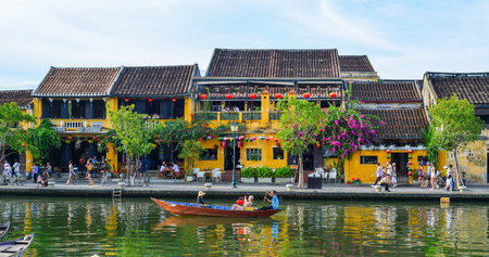Hoi An, Vietnam - Jul 19, 2018. Old buildings with the river in Hoi An, Vietnam. The historic old town of Hoi An is UNESCO World Heritage Site since 1999.のeditorial素材