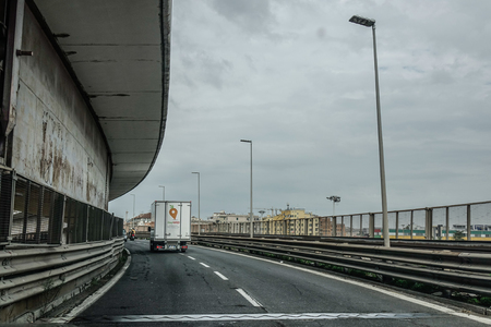 Rome, Italy - Oct 13, 2018. Vehicles run on highway in Rome, Italy. The total length of Autostrade (highway in Italy) is about 6,758 kilometres.のeditorial素材