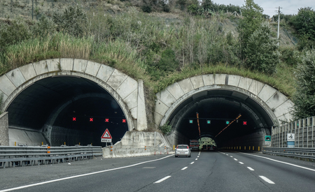 Rome, Italy - Oct 13, 2018. A four lane road passing through a tunnel in Rome, Italy. The total length of Autostrade (highway in Italy) is about 6,758 kilometres.のeditorial素材