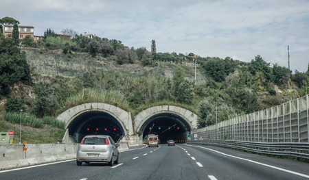 Rome, Italy - Oct 13, 2018. A four lane road passing through a tunnel in Rome, Italy. The total length of Autostrade (highway in Italy) is about 6,758 kilometres.のeditorial素材