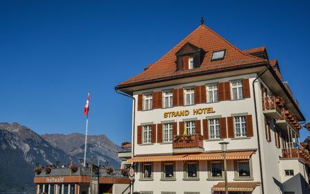 Brienz, Switzerland - Oct 21, 2018. Luxury hotel near the Lake Brienz, Switzerland. The turquoise Lake Brienz is set amid the spectacular mountain scenery.のeditorial素材