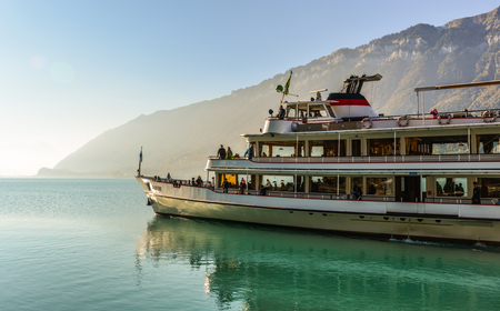 Brienz, Switzerland - Oct 21, 2018. Tourist ferry on the lake in Brienz, Switzerland. The turquoise Lake Brienz is set amid the spectacular mountain scenery.のeditorial素材
