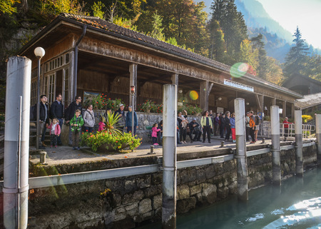 Interlaken, Switzerland - Oct 21, 2018. Passengers waiting at the tourist jetty on Brienz Lake in Interlaken, Switzerland.のeditorial素材
